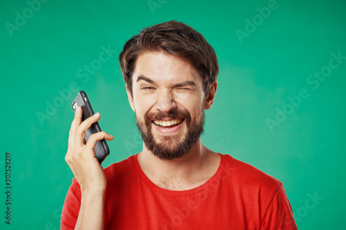 young man with mobile phone © SHOTPRIME STUDIO