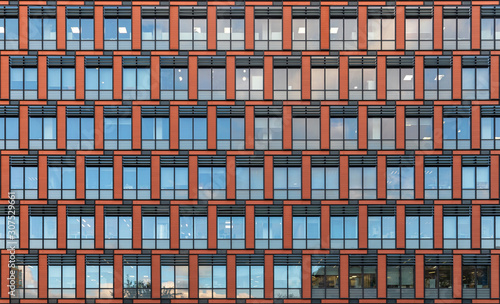 Canvas Print Modern facade of the office building. Architectural details.