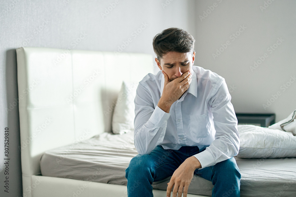 young man sitting on sofa