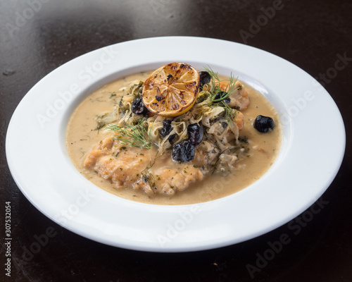 Chicken marsala topped with fresh mushrooms. A creamy and delicious Italian dish
