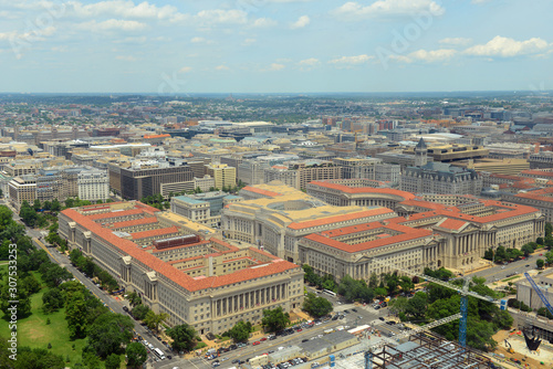 Fototapeta Naklejka Na Ścianę i Meble -  US Commerce Department, Andrew W Mellon Auditorium, Ronald Reagan Building and Old Post Office in Federal Triangle aerial view from the top of Washington Monument, Washington, District of Columbia DC,