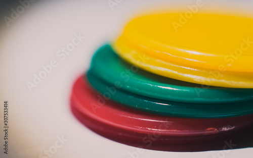 stack of colorful plates isolated on white background