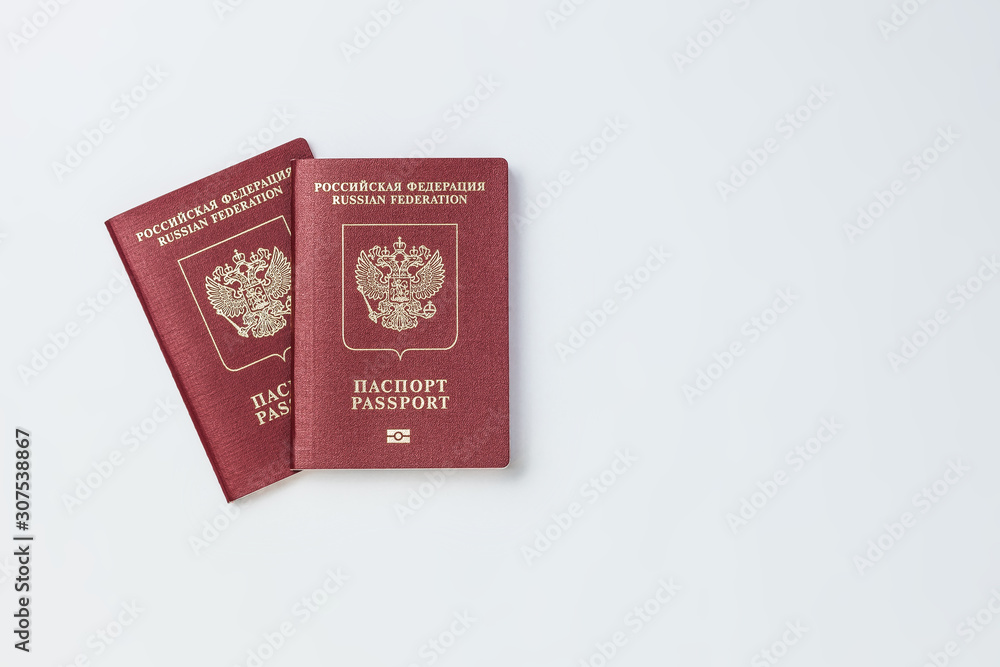 Two Russian passports on a white background isolate Two Russian passports on a white background isolate