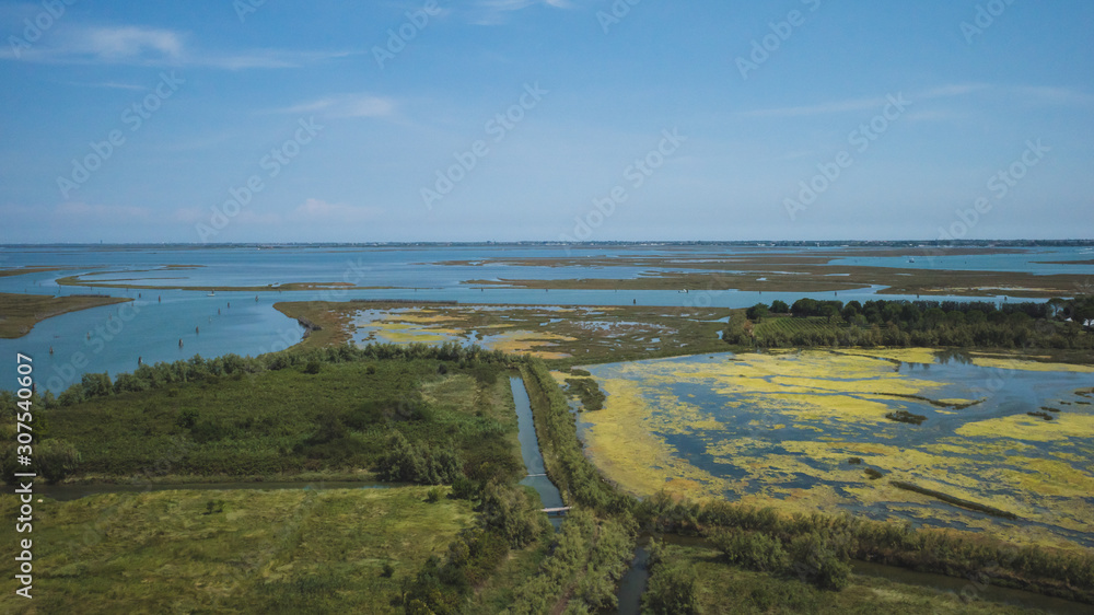 View of island of Torcello and lagoon, from bell tower of Cathedral of Santa Maria Assunta, Torcello, Venice, Italy View of island of Torcello and lagoon, from bell tower of Cathedral of Santa Maria Assunta, Torcello, Venice, Italy