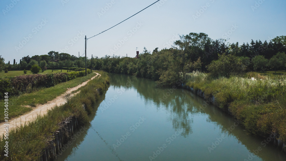 Obraz premium Path by river on island of Torcello, Venice, Italy