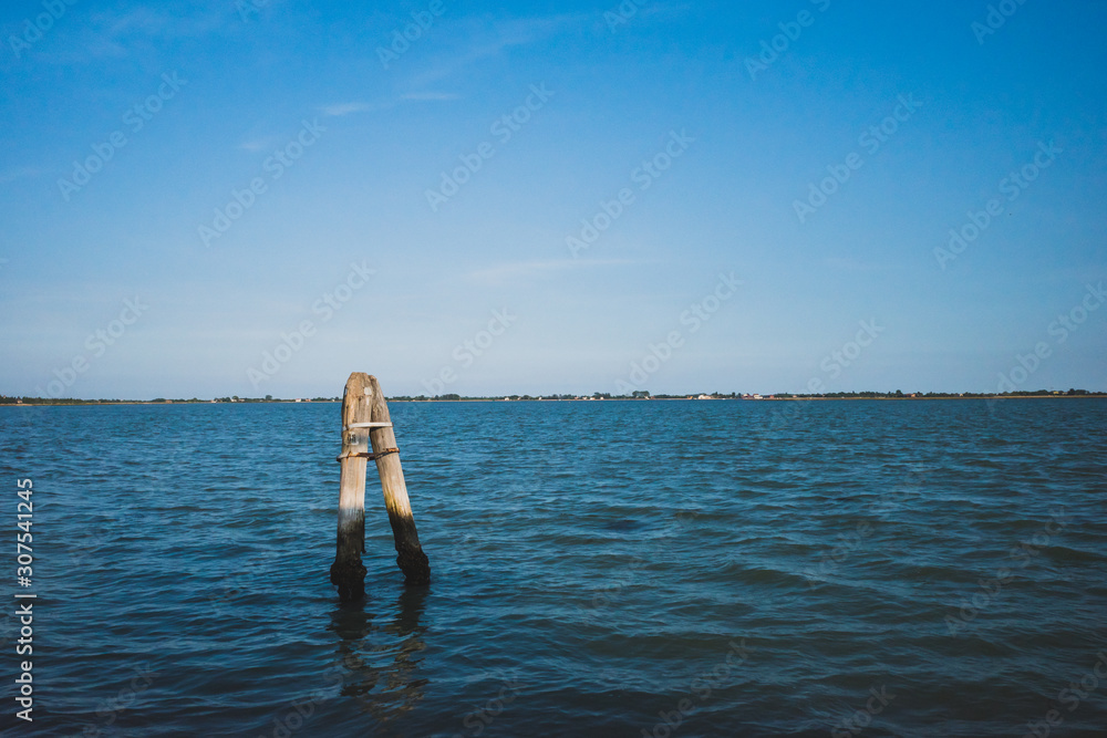 View of lagoon under blue sky, Venice, Italy View of lagoon under blue sky, Venice, Italy