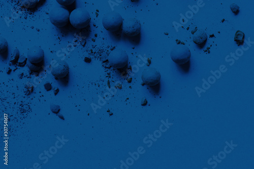 Abstract background with classic blue color balls and crumbs