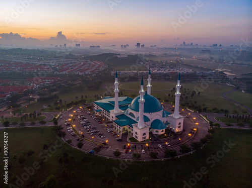 Photography Aerial shot of sunrise over the beautiful mosque at Johor Bahru, Malaysia