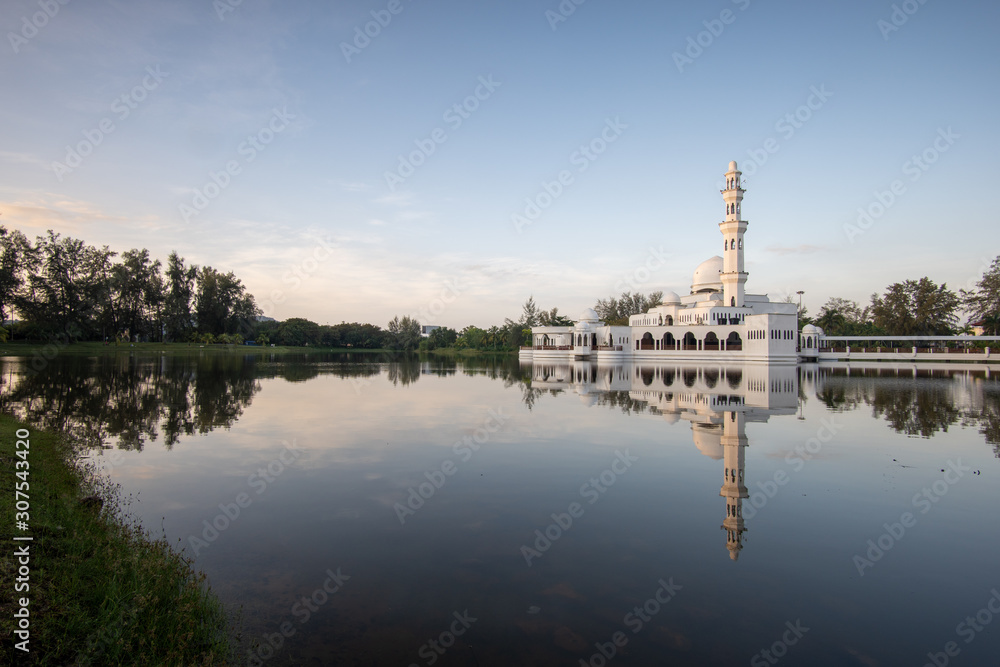 Morning scenery over the white floating mosque.