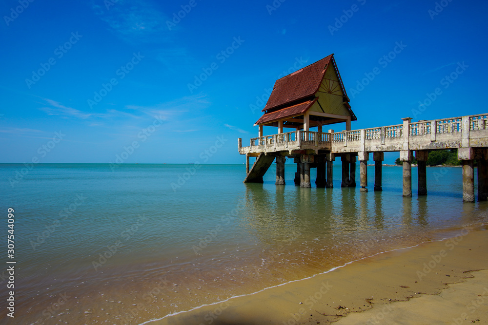 Tropical seascape view with blue sky and ocean background.