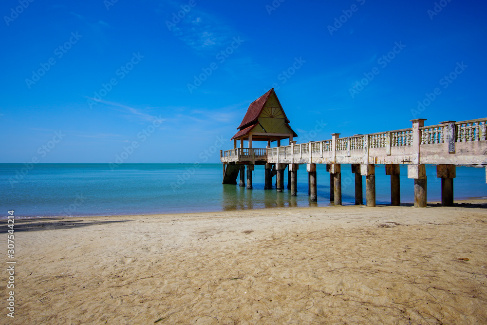 Tropical seascape view with blue sky and ocean background.