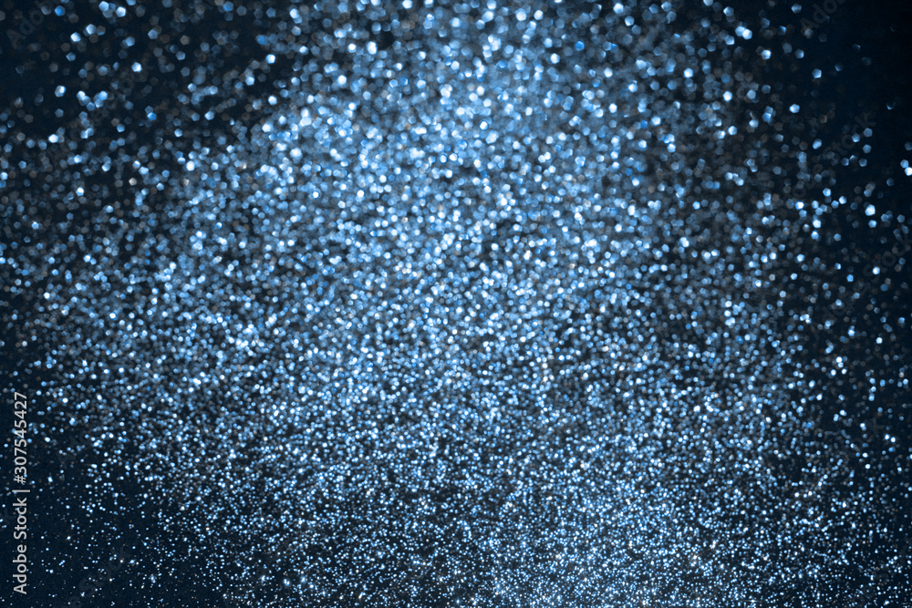 Color blue glitter trendy festive background. 2020 year trend