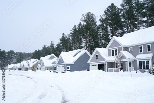 Obraz na plátně houses in residential community after snow in winter