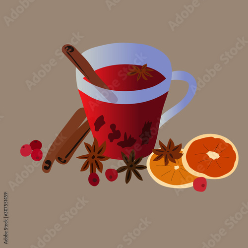 mulled wine in a glass glass with cinnamon orange and berry