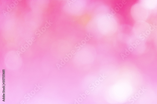 Beautiful pink bokeh out of focus background from tree in nature, abstract art