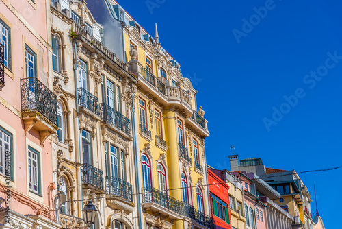 Colorful facades of houses on boulevard Ferreira Borges at Coimbra, Portugal photo