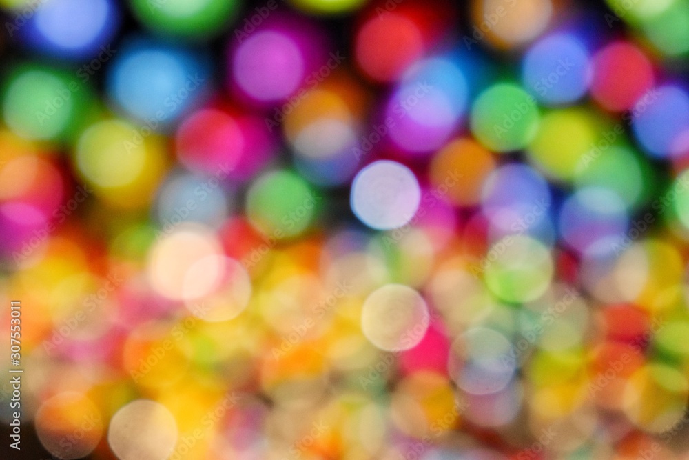 Fototapeta premium abstract colorful background of christmas lights. Colorful bokeh of LED light, concept for happiness moment, celebration, festival.