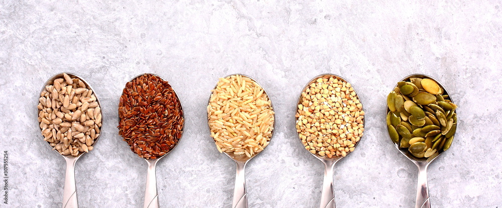 Spices in spoons on the table. Spices in spoons on the table.