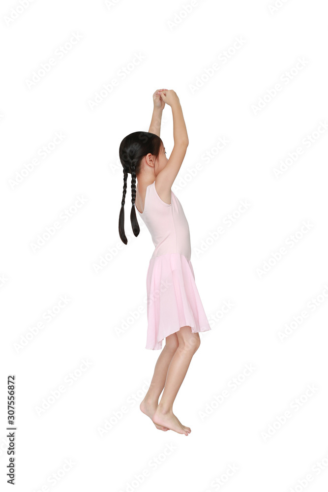 Little Asian child girl ballerina in pink tutu skirt isolated on white background. Kid practise her dance. Children ballet dancer side view. Little Asian child girl ballerina in pink tutu skirt isolated on white background. Kid practise her dance. Children ballet dancer side view.