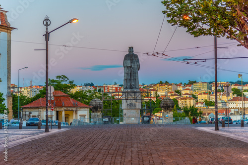 Statue of Dom Dinis at Coimbra, Portugal photo