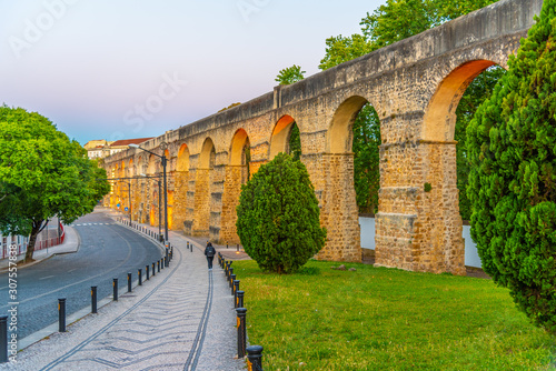 Sunset view of aqueduct passing by next to the botanical garden at Coimbra, Portugal