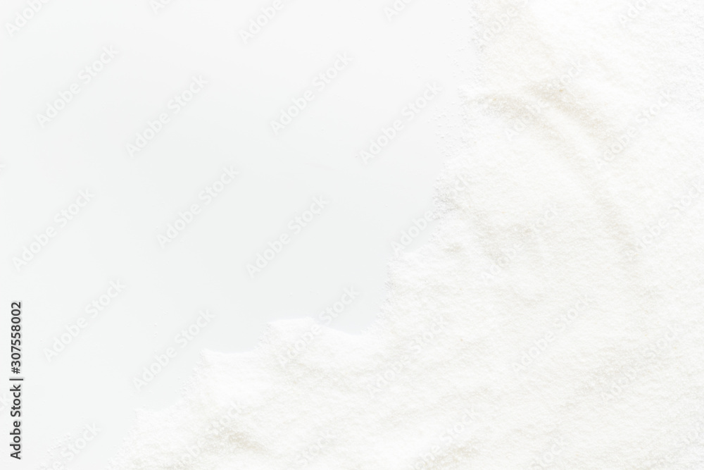 Washing powder scattered on white background top view frame copy space Washing powder scattered on white background top view frame copy space