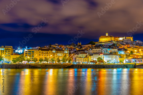 Night view of cityscape of old town of Coimbra, Portugal