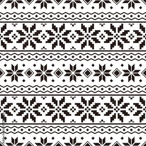 Geometric Christmas Ethnic pattern on white background. Ornament. Border. Seamless sample. It can be used as a background. Vector illustration