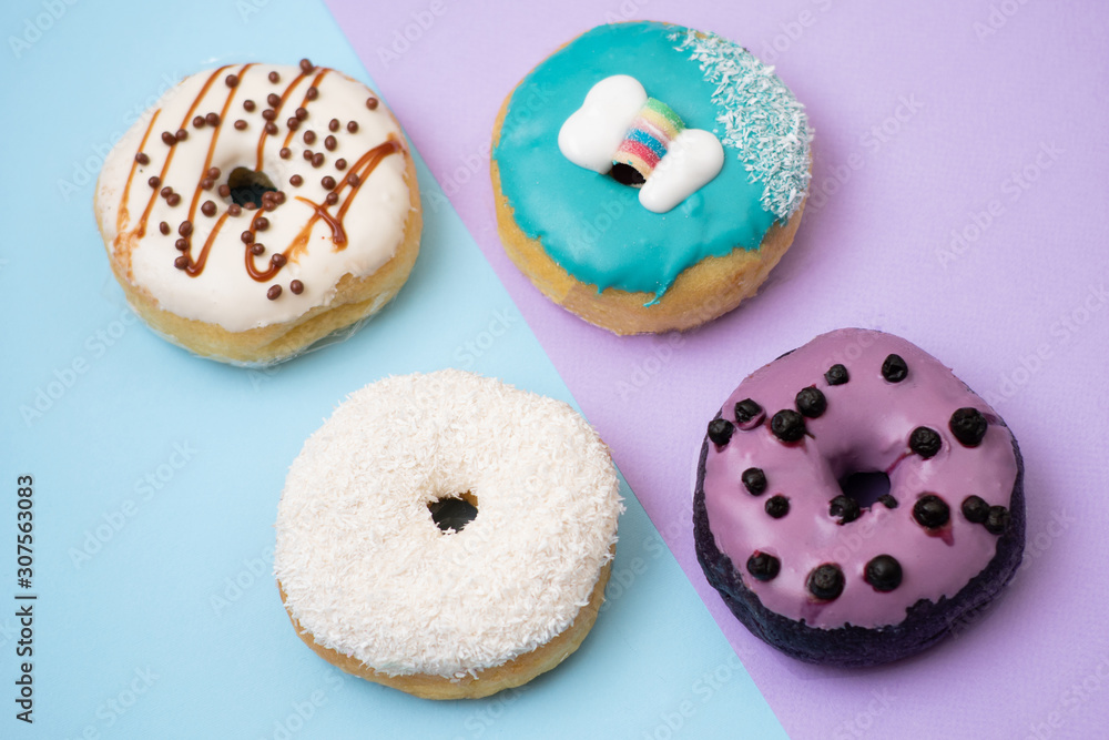 close up of donut on blue background close up of donut on blue background