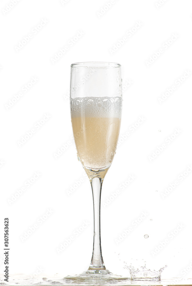 pouring white wine, champagne into a tall glass, strong flow and splash pouring white wine, champagne into a tall glass, strong flow and splash
