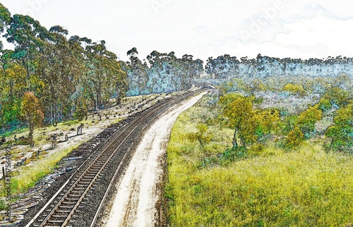 Landscape with railway tracks running through a rural area