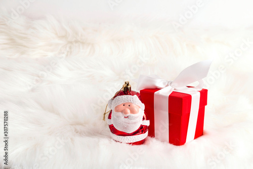 Wallpaper Mural Red gift box with little santa over fur background. Torontodigital.ca
