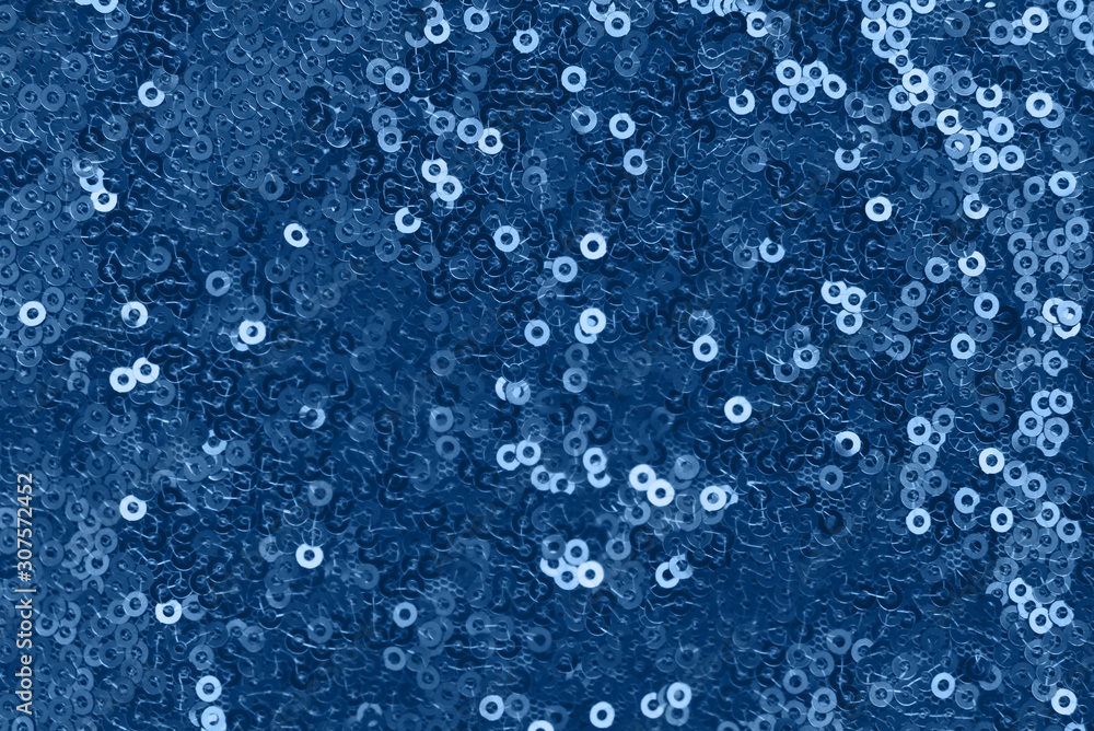 Shiny fabric with sequins, abstract background toned blue color. Shiny fabric with sequins, abstract background toned blue color.