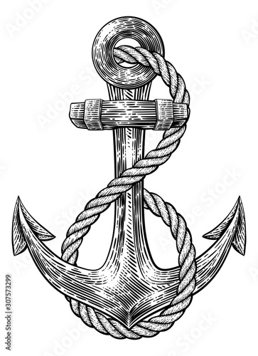 An anchor from a boat or ship with a rope wrapped around it tattoo
