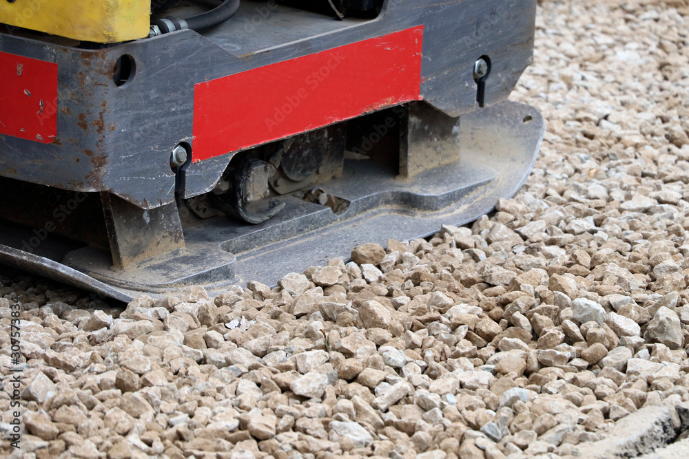 Vibrating machine on construction site Vibrating machine on construction site