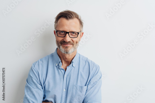 Bearded middle-aged man wearing glasses photo