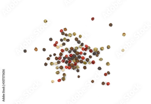 Spice of multicolored pepper isolated on white background.