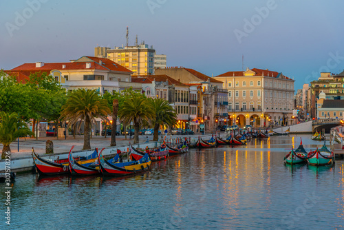 Moliceiro boats mooring alongside the central channel at Aveiro, Portugal