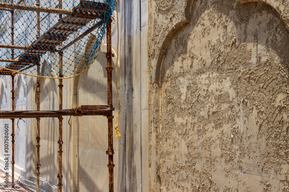 Details of Taj Mahal: Close-up restoration works of Motifs, Fresco and inscription on the wall. UNESCO World Heritage in Agra. Details of Taj Mahal: Close-up restoration works of Motifs, Fresco and inscription on the wall. UNESCO World Heritage in Agra.