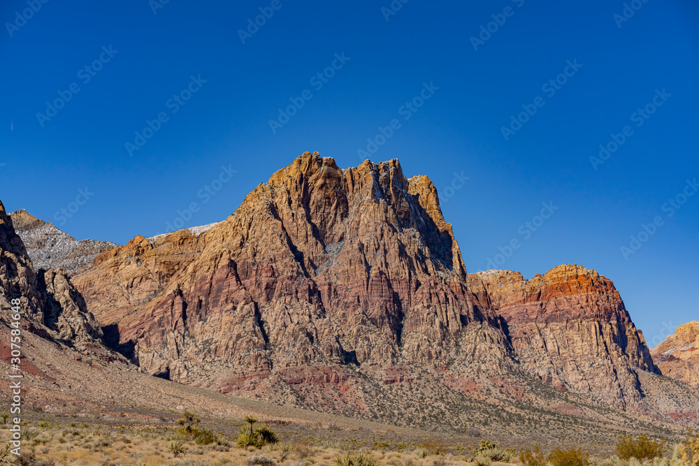 Fototapeta premium Winter snowy landscape of the famous Red Rock Canyon