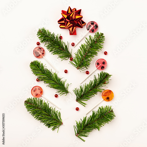 Wood christmas background with christmas gifts and candy cane, top view