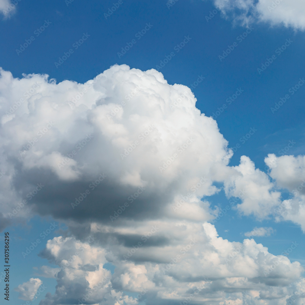 Beautiful blue sky with white clouds as a natural background. Beautiful blue sky with white clouds as a natural background.