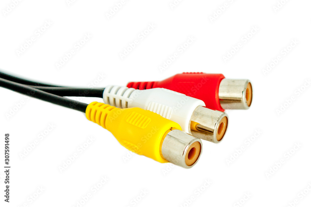 Three multi-colored plug with a RCA jack on a white background close-up. Three multi-colored plug with a RCA jack on a white background close-up.