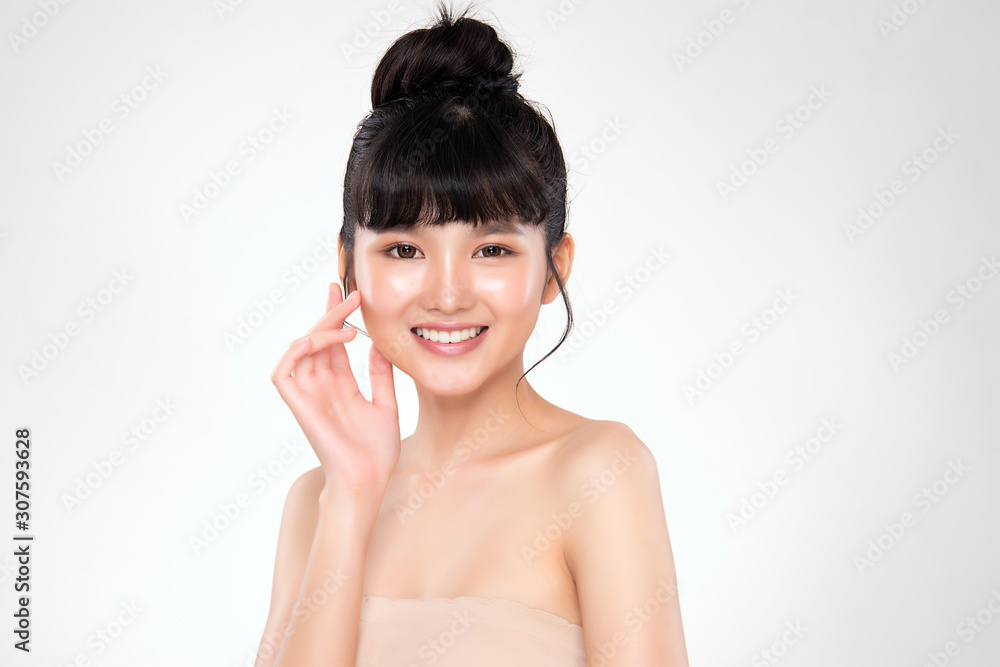 Beautiful Young Asian Woman with Clean Fresh Skin. Face care, Facial treatment, on white background, Beauty and Cosmetics Concept. Beautiful Young Asian Woman with Clean Fresh Skin. Face care, Facial treatment, on white background, Beauty and Cosmetics Concept.