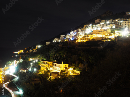 Fototapeta Naklejka Na Ścianę i Meble -  Night landscape of a small town on the Amalfi coast in Italy