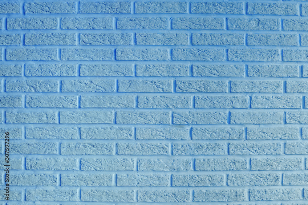 Obraz premium Light brick wall for background or texture. Copy space for your design. Blue tinting.