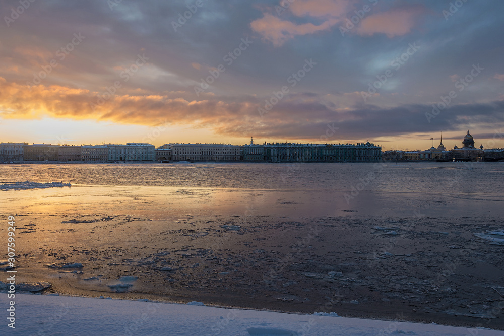 colorful sunrise over the Neva river and Palace embankment