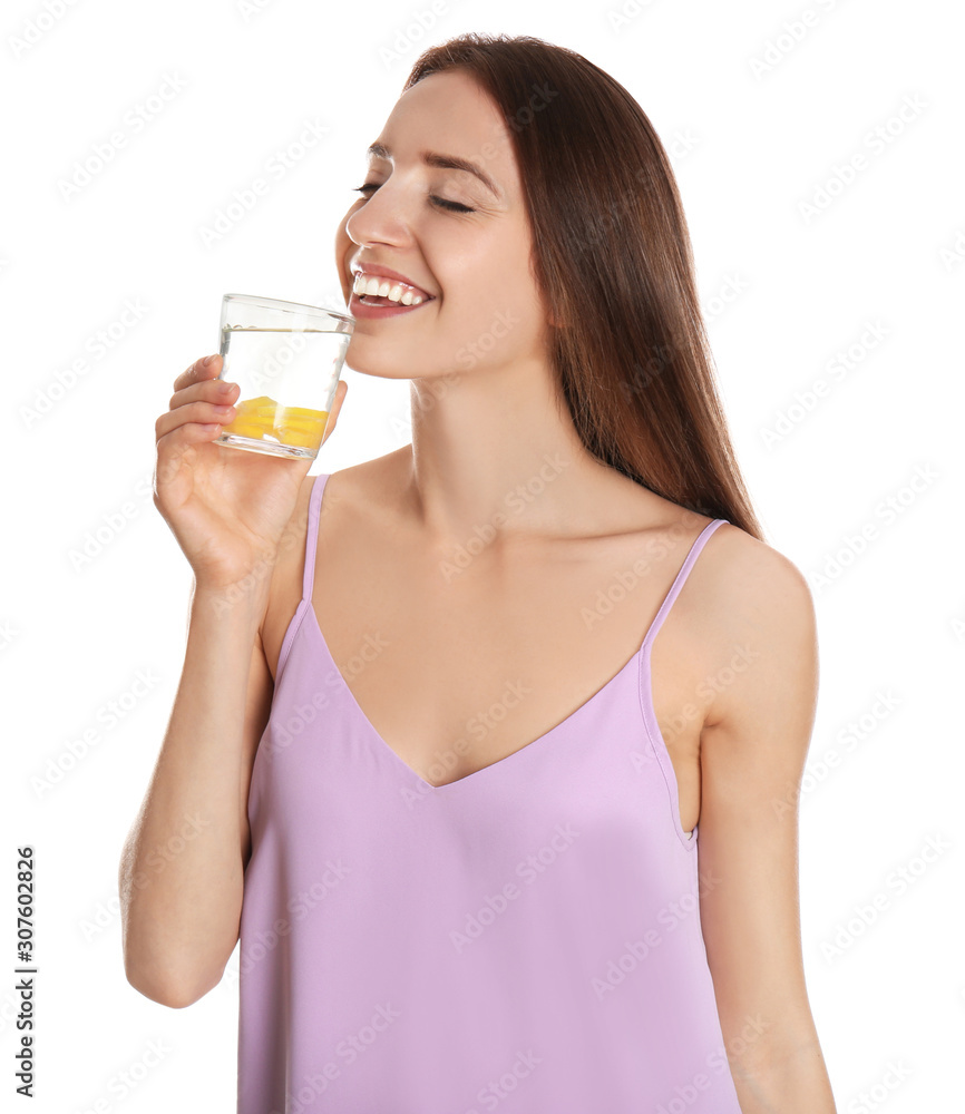 Young woman drinking lemon water on white background Young woman drinking lemon water on white background