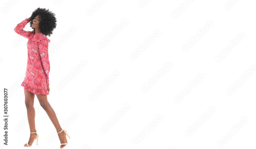 The full body picture of beautiful afro model in pink pattern mini dress. The full body picture of beautiful afro model in pink pattern mini dress.