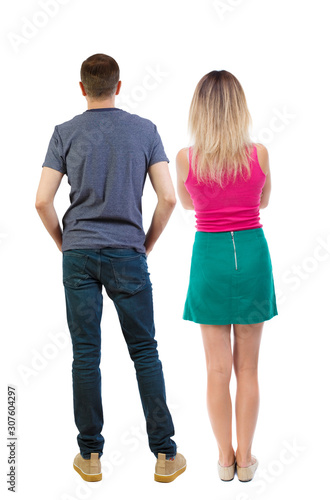 Back view of couple. beautiful friendly girl and guy together.